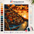 Diamond painting artwork featuring a colourful sunset harbor scene created with sparkling resin gems.