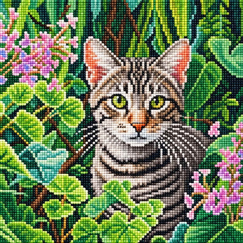 Diamond painting artwork featuring a grey tabby cat surrounded by lush green leaves and delicate pink flowers, created with sparkling faceted resin gems.